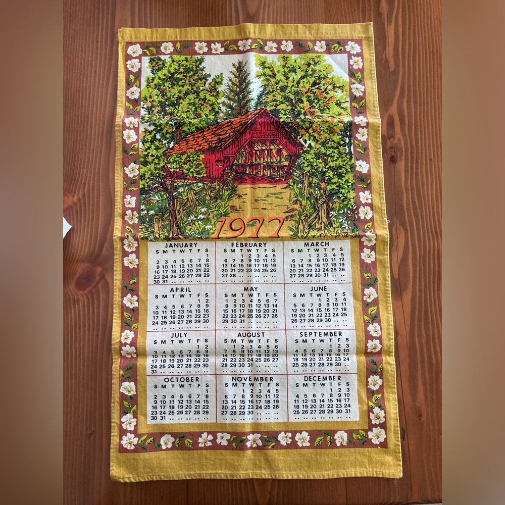 Year 1977 calendar tea towel.